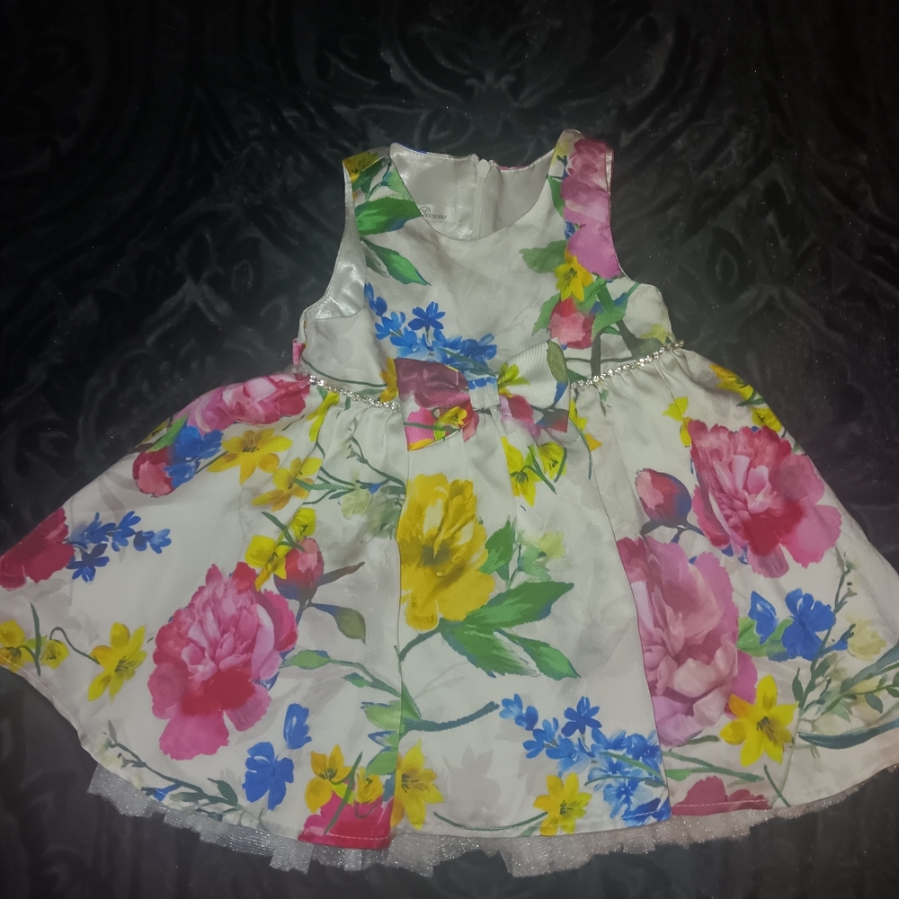 Beautiful floral  dress with rhinestones. For your adorable one. Size 24 months.